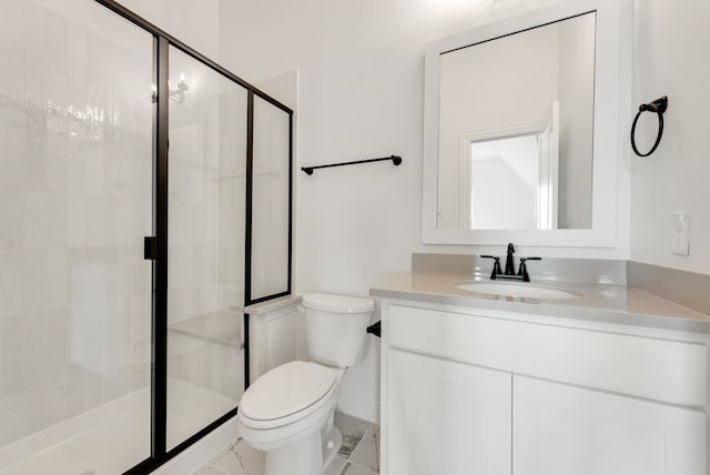 bathroom featuring vanity, toilet, and walk in shower