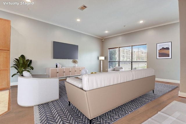 dining area featuring crown molding and light carpet