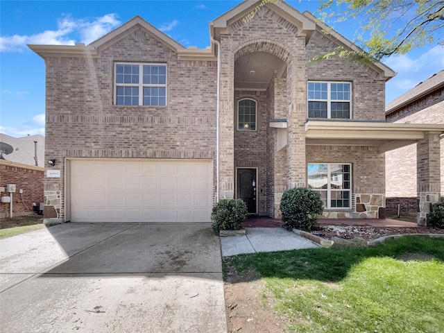 view of front of property featuring a garage