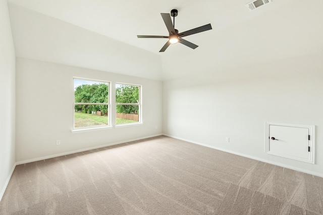 empty room with ceiling fan, carpet, visible vents, and baseboards