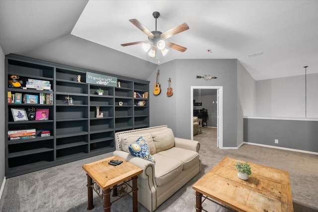 living area with carpet flooring, ceiling fan, and lofted ceiling