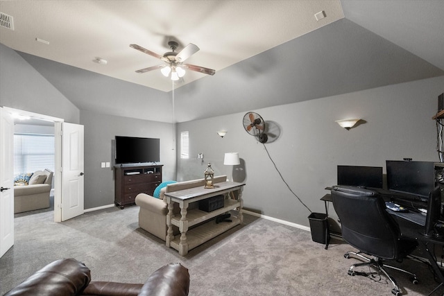 office space featuring light carpet, ceiling fan, and lofted ceiling