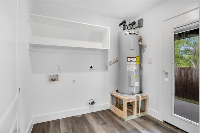 clothes washing area with hookup for a gas dryer, water heater, washer hookup, dark hardwood / wood-style floors, and hookup for an electric dryer