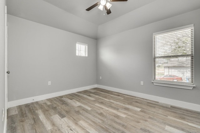 spare room featuring light hardwood / wood-style flooring and ceiling fan