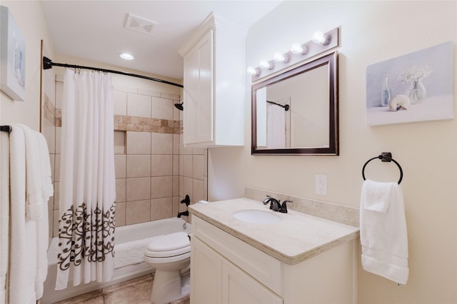 full bathroom featuring vanity, toilet, and shower / bath combo with shower curtain