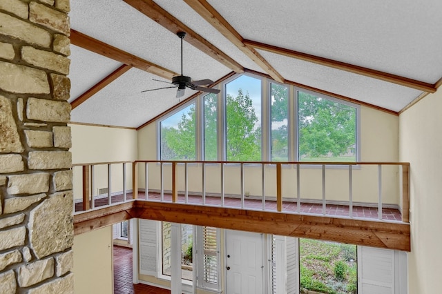 room details featuring a textured ceiling and ceiling fan