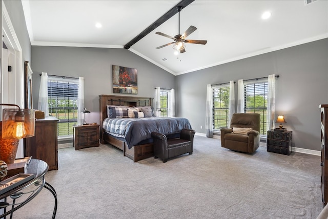 bedroom with lofted ceiling with beams, ceiling fan, crown molding, and light colored carpet