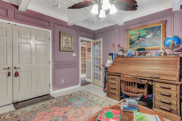 home office featuring beamed ceiling, ceiling fan, coffered ceiling, crown molding, and french doors