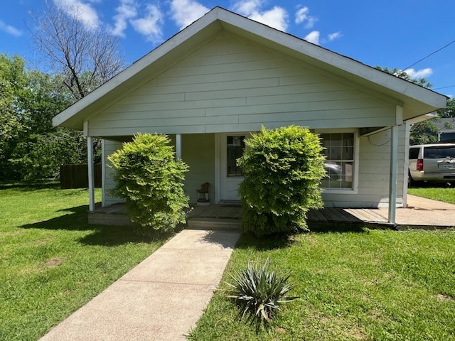 bungalow with a front yard