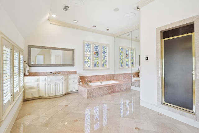 bathroom featuring a wealth of natural light, tile patterned floors, plus walk in shower, and vanity