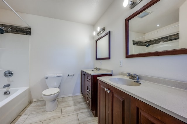 full bathroom featuring tile patterned flooring, vanity,  shower combination, and toilet