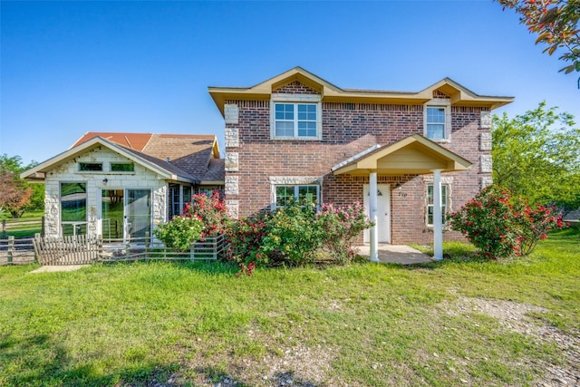 view of front of property with a front lawn