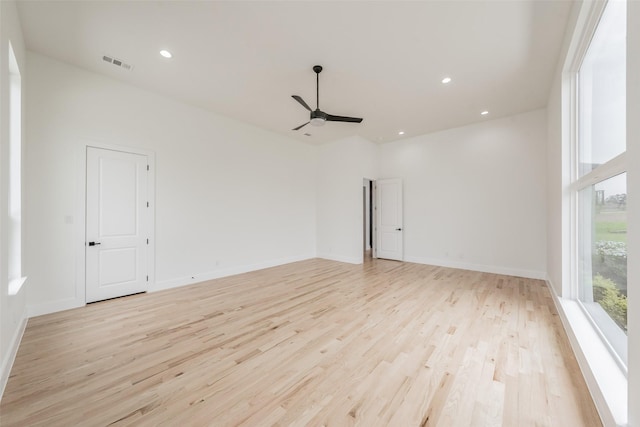 spare room with ceiling fan and light hardwood / wood-style floors