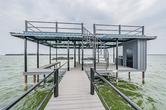 dock area with a water view