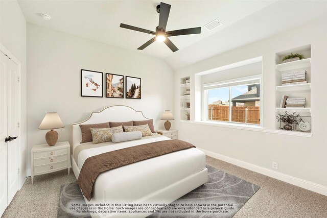 carpeted bedroom featuring ceiling fan and vaulted ceiling