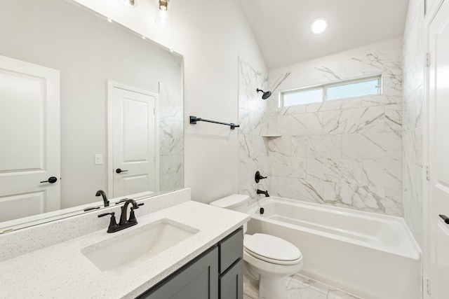 full bathroom featuring vanity, tiled shower / bath combo, toilet, and lofted ceiling