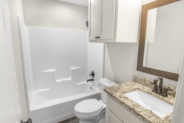 full bathroom with shower / bathing tub combination, vanity, and toilet