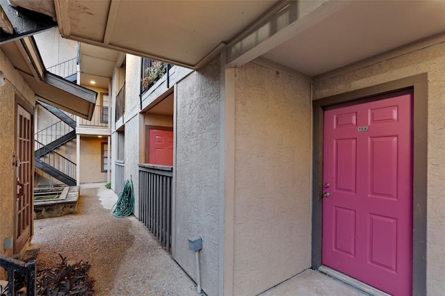 doorway to property featuring a balcony