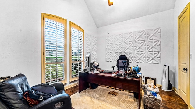 office area with hardwood / wood-style floors and lofted ceiling