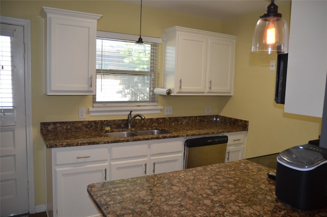 kitchen with dishwasher, white cabinetry, and pendant lighting