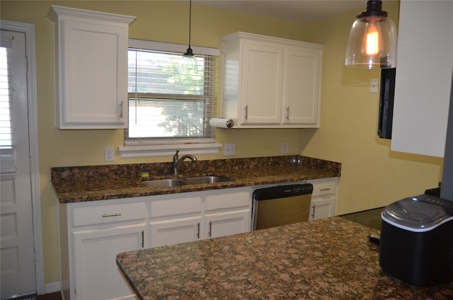 kitchen featuring pendant lighting, sink, white cabinets, and dishwasher