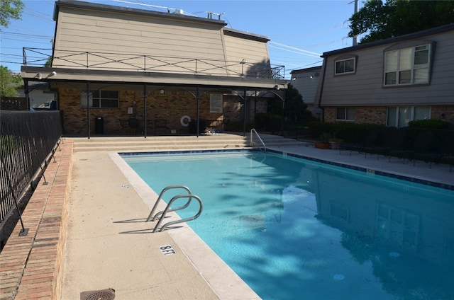 view of pool with a patio area