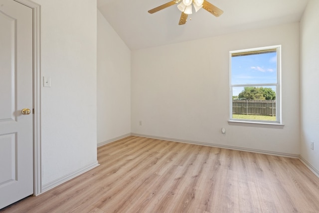 empty room featuring ceiling fan and light hardwood / wood-style floors