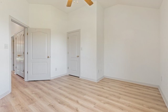 unfurnished room featuring ceiling fan, high vaulted ceiling, and light hardwood / wood-style floors