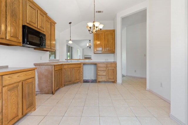 kitchen with light tile floors, kitchen peninsula, a notable chandelier, lofted ceiling, and hanging light fixtures