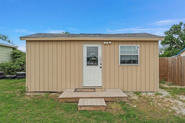 view of shed / structure with a lawn