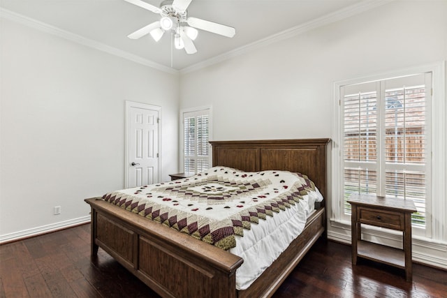 bedroom featuring ceiling fan, crown molding, and dark wood-type flooring