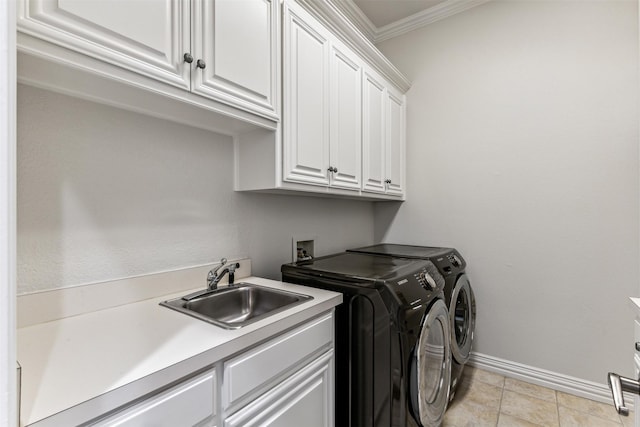 washroom with sink, cabinets, light tile patterned flooring, washer and dryer, and ornamental molding