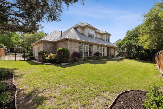 view of front of house with a front lawn