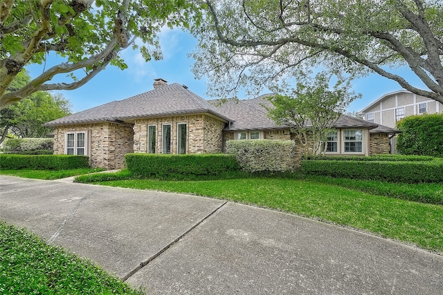 view of front of home with a front yard