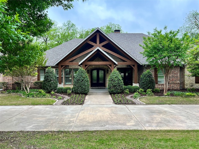 craftsman house featuring french doors