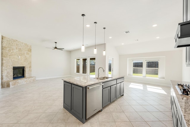 kitchen with ceiling fan, pendant lighting, a healthy amount of sunlight, and appliances with stainless steel finishes