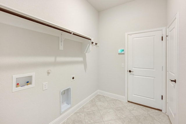 clothes washing area featuring hookup for an electric dryer, washer hookup, hookup for a gas dryer, and light tile patterned flooring