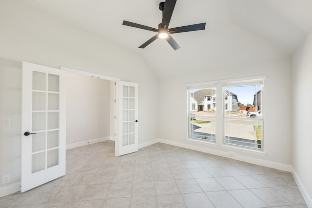 unfurnished room featuring ceiling fan, french doors, light tile patterned floors, and lofted ceiling