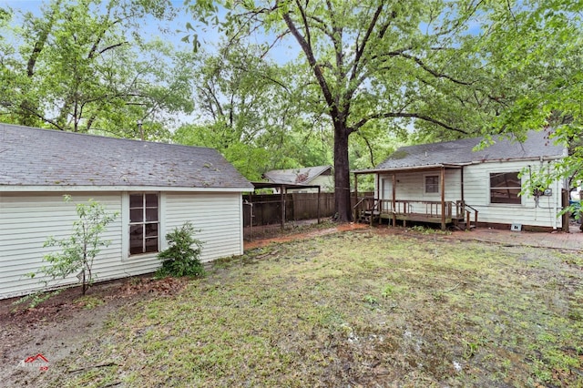 view of yard featuring a wooden deck