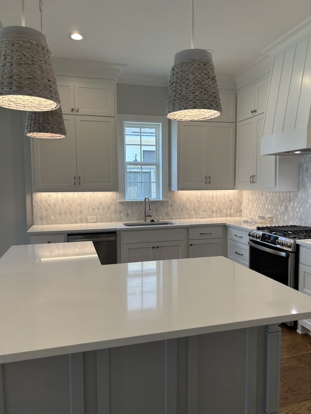 kitchen with dishwashing machine, custom exhaust hood, ornamental molding, a sink, and light countertops