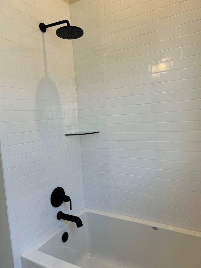 details featuring shower / bathing tub combination