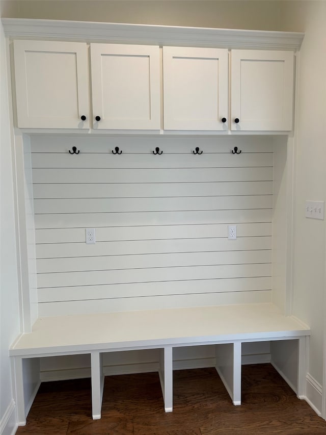 mudroom featuring dark wood-style flooring