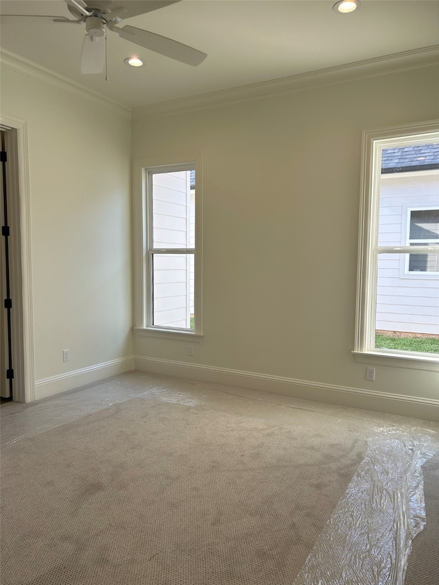 unfurnished room with recessed lighting, baseboards, and ornamental molding