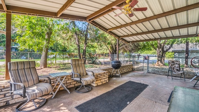 view of patio with a ceiling fan and a fenced backyard