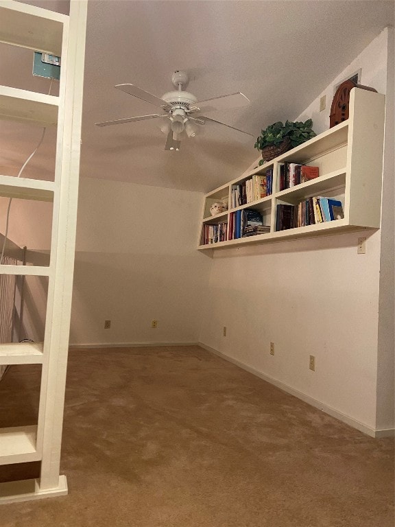 carpeted empty room with ceiling fan