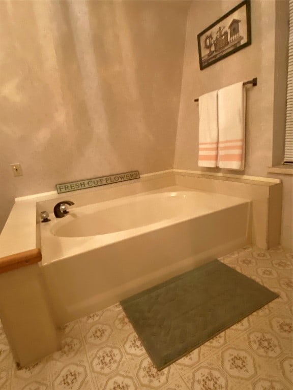 bathroom with a bathing tub