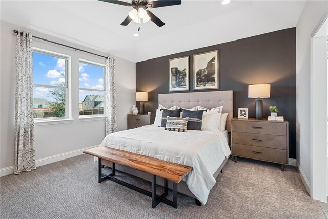 bedroom featuring ceiling fan and carpet flooring