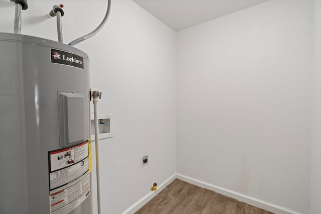 laundry room with washer hookup, hookup for an electric dryer, hardwood / wood-style floors, and electric water heater