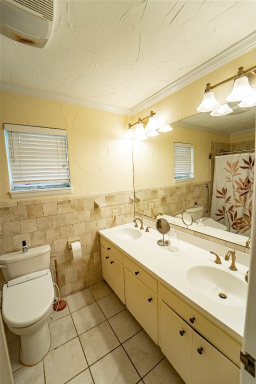 bathroom featuring tile walls, tasteful backsplash, toilet, and double vanity