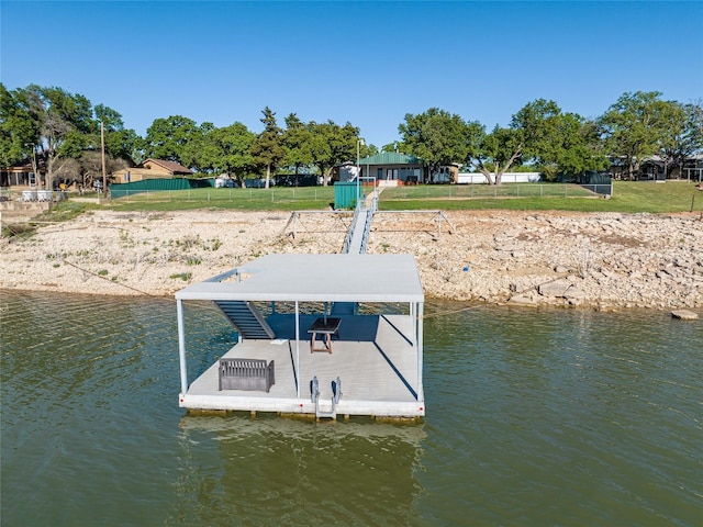 dock area with a water view